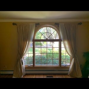 Gold colored silk drapes with sheer detailed edge